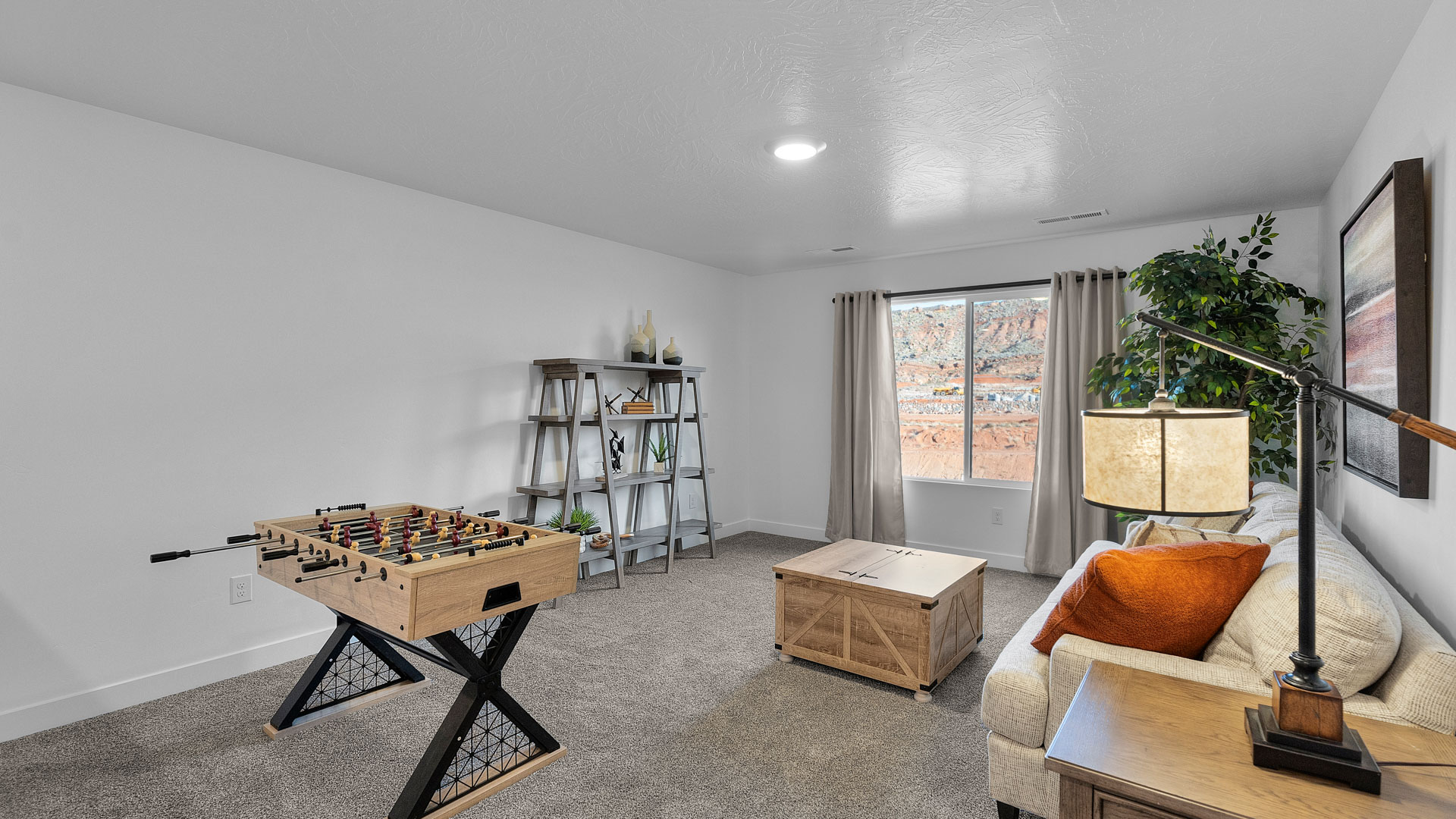 Upstairs loft space with large window.