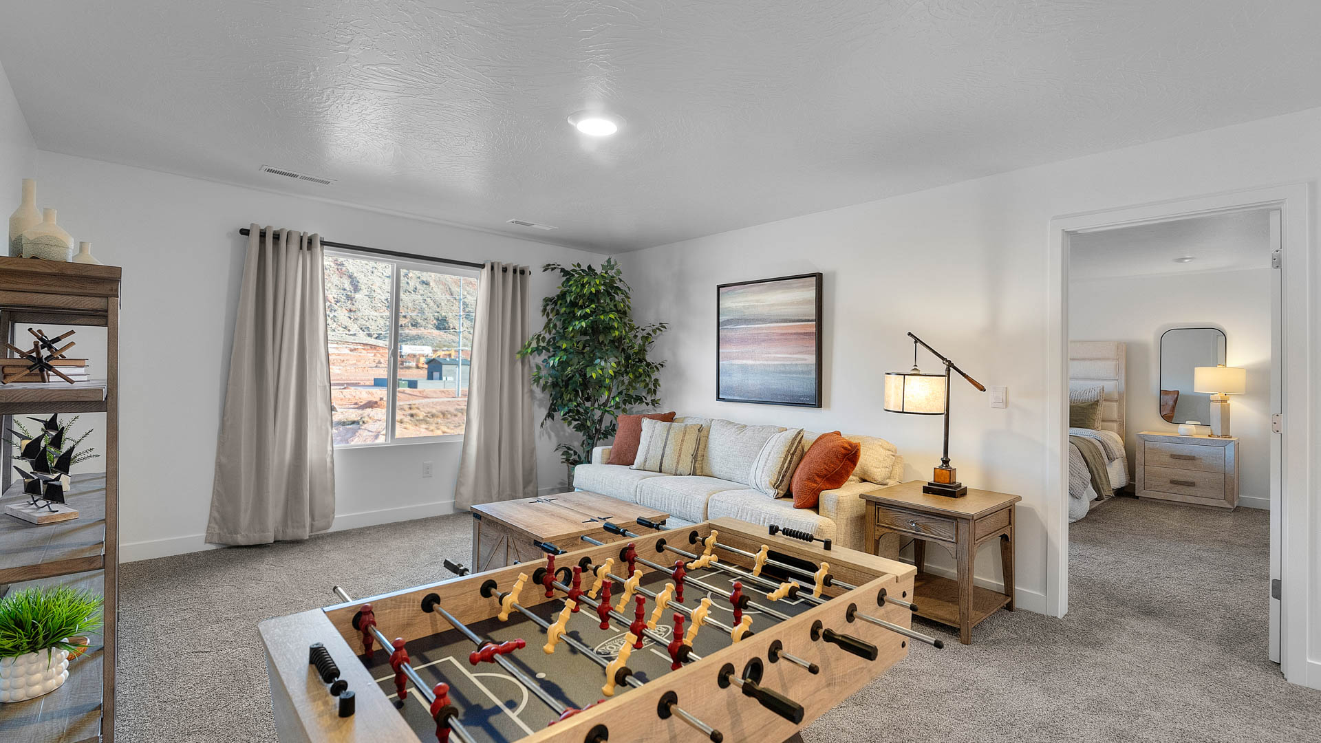 Upstairs loft space with large window.