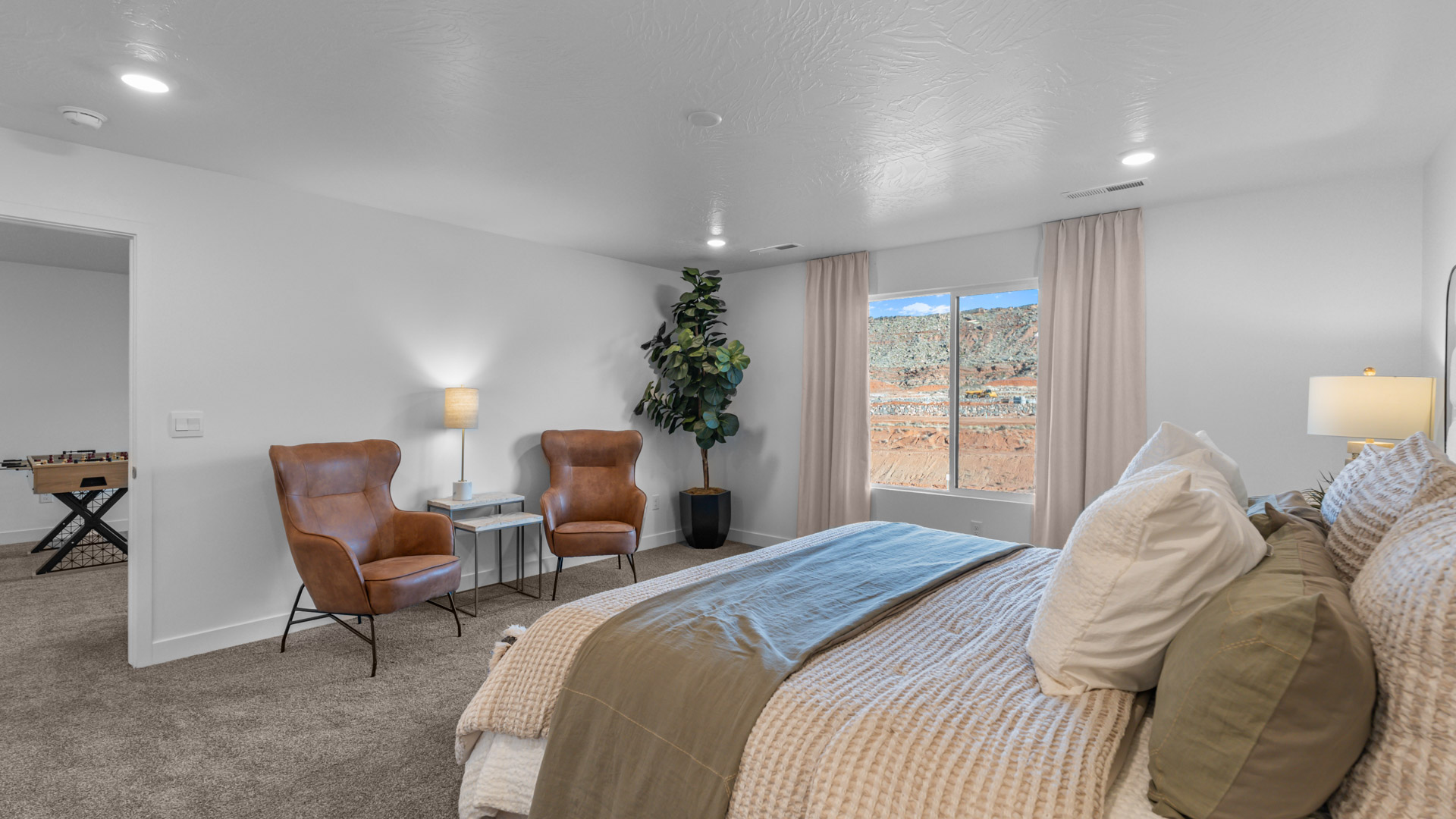 Large bedroom with oversized picture window