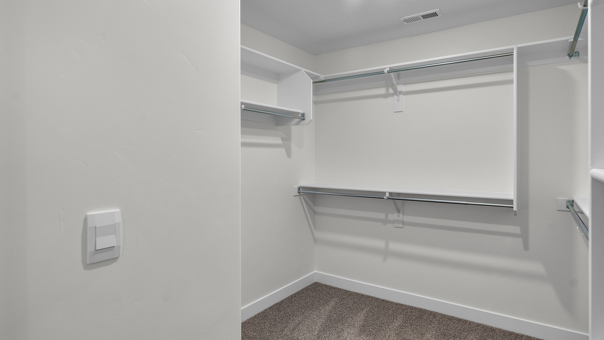 Walk in closet with built in shelving
