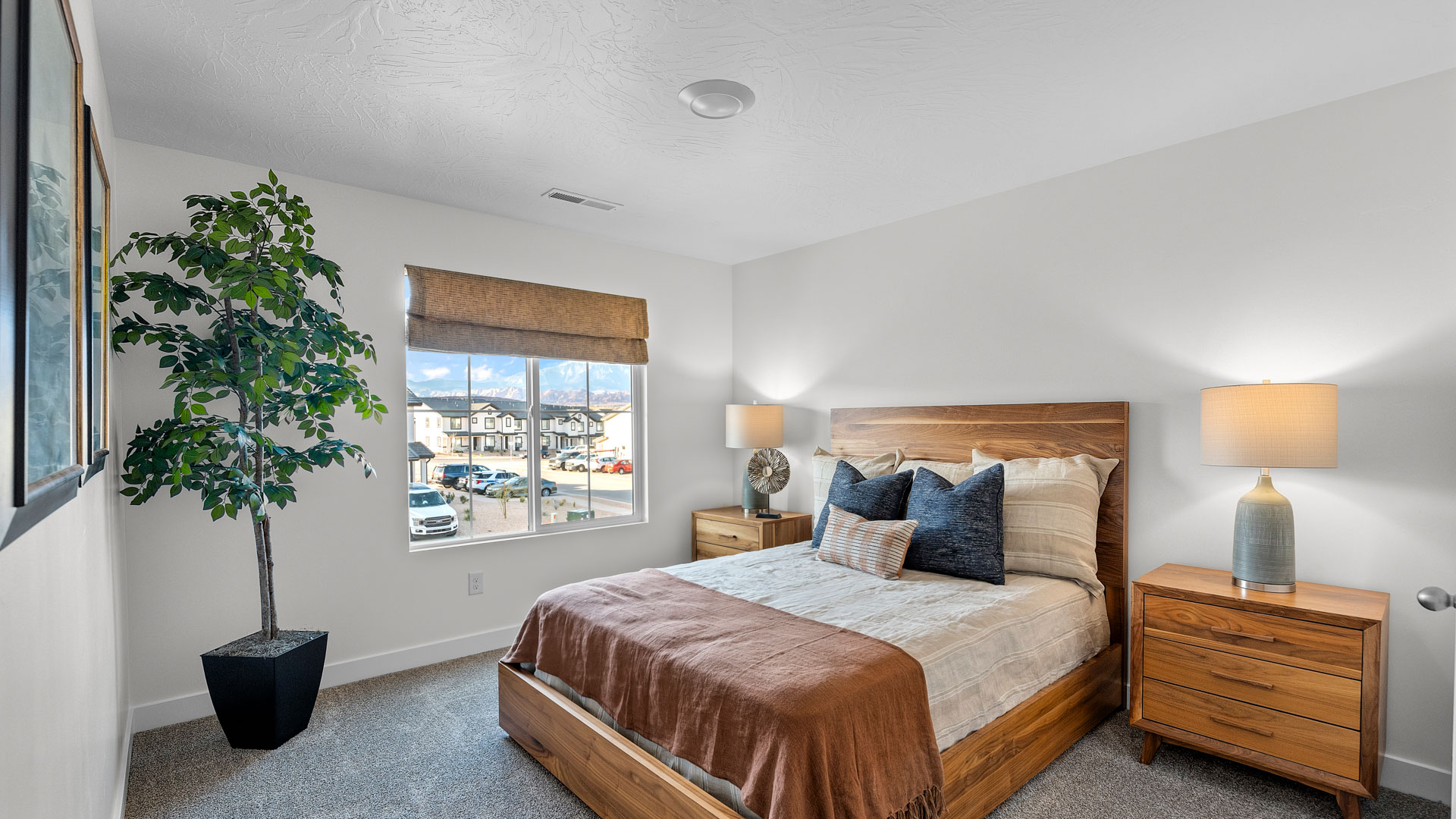 Large bedroom with oversized picture window
