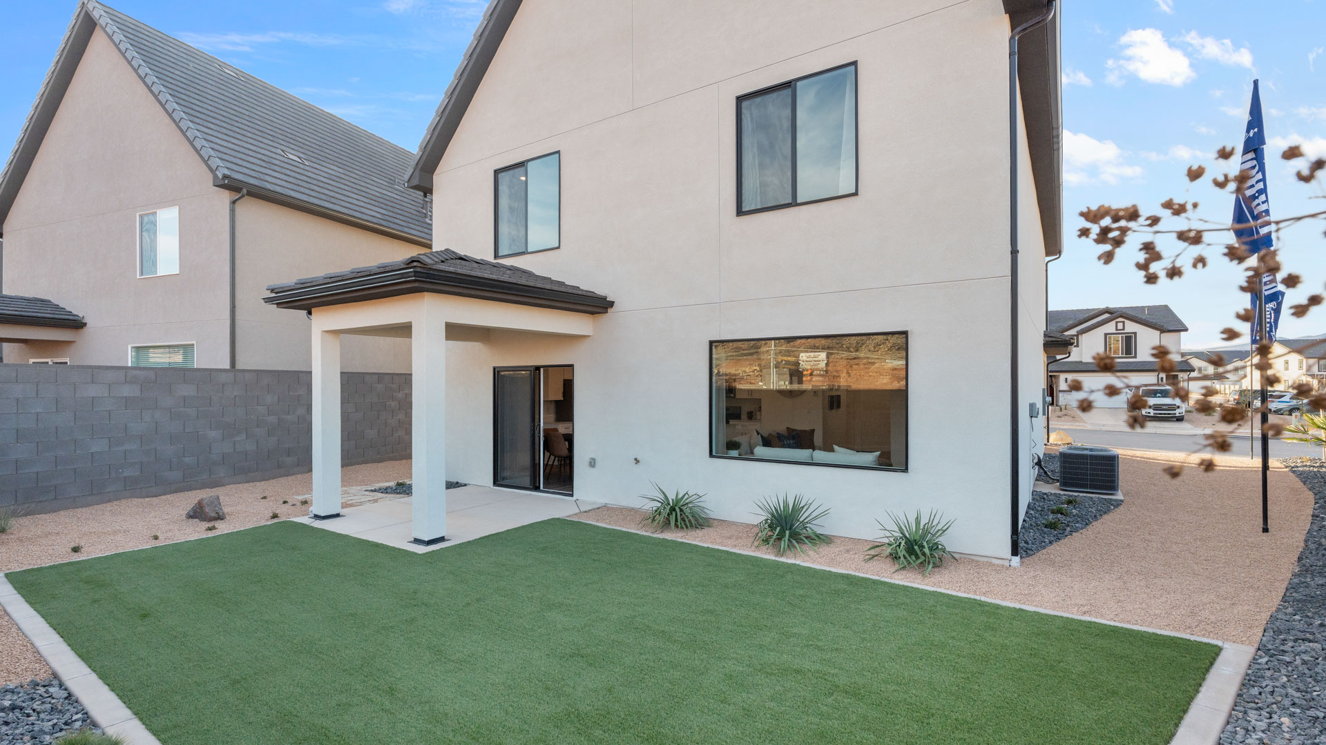 Backyard with covered patio.