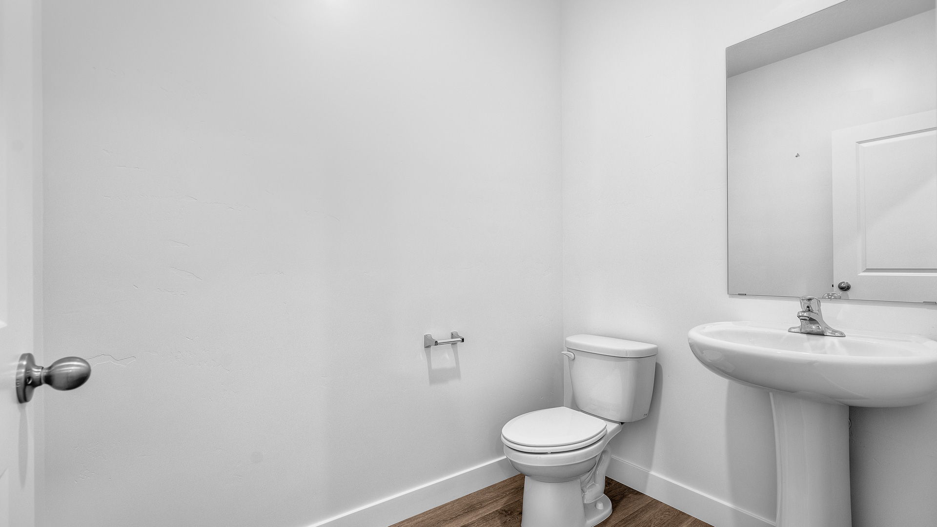 Powder bath with pedestal sink.