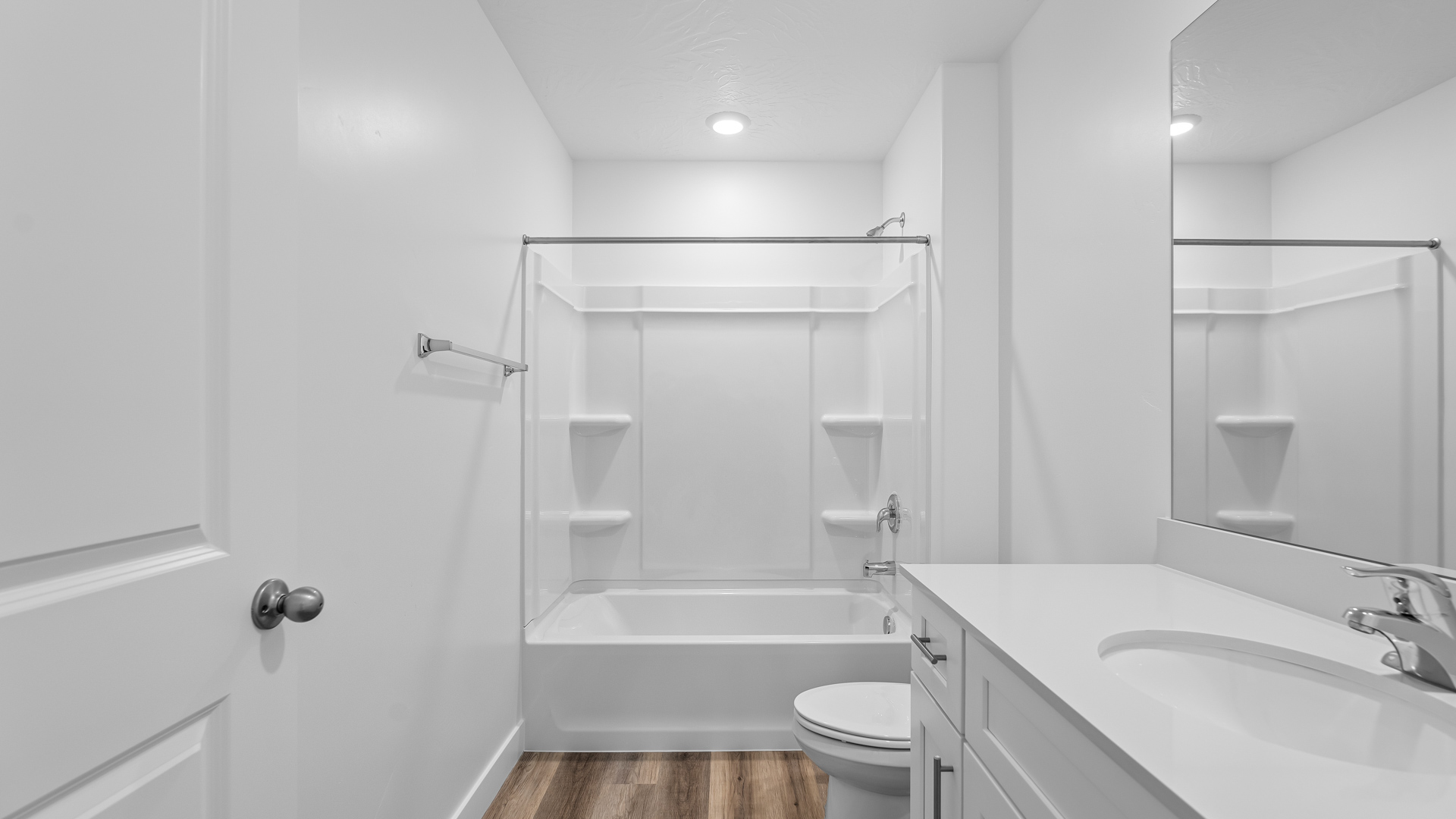 Bathroom with shower surround.