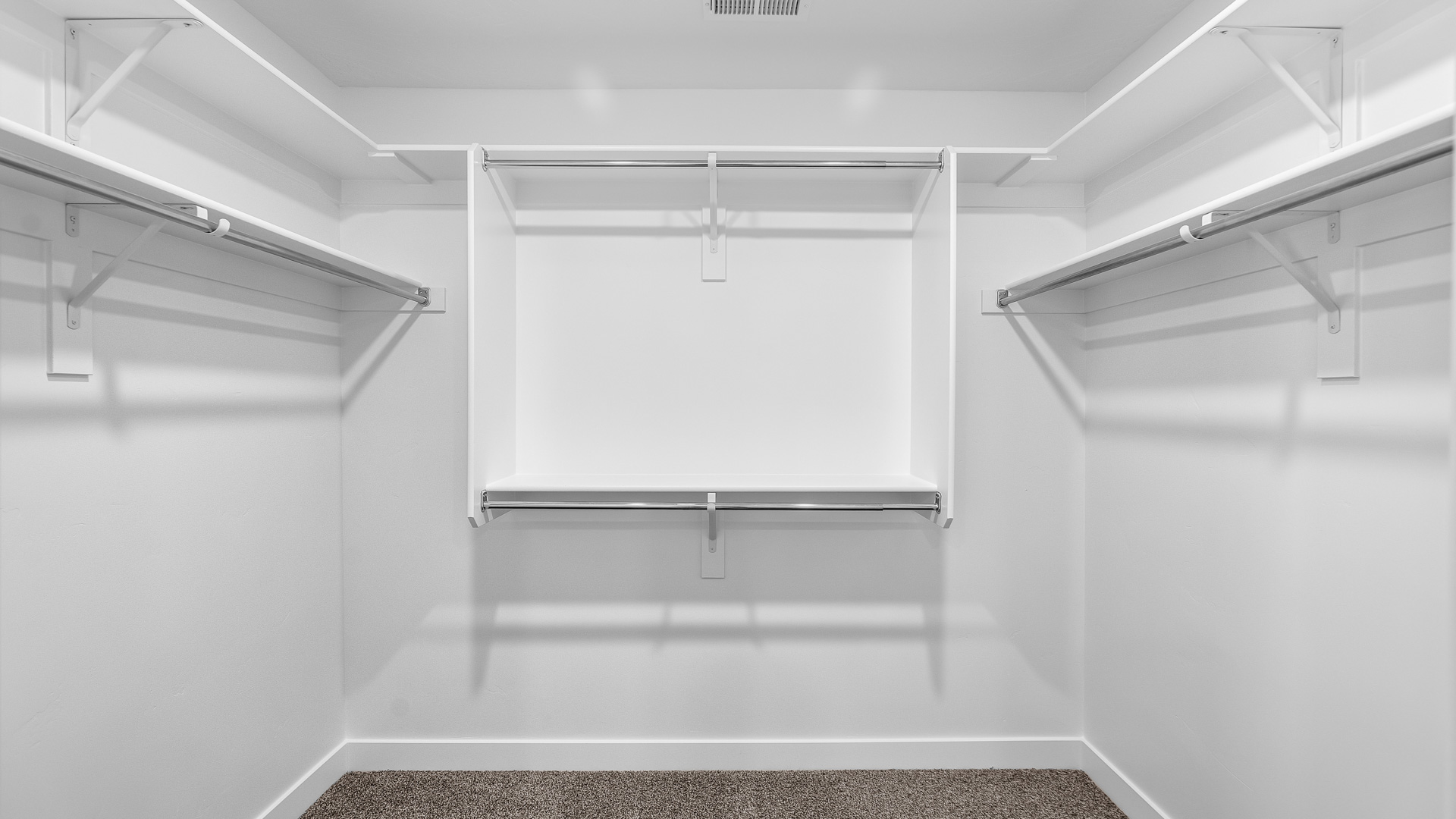 Primary walk-in closet.