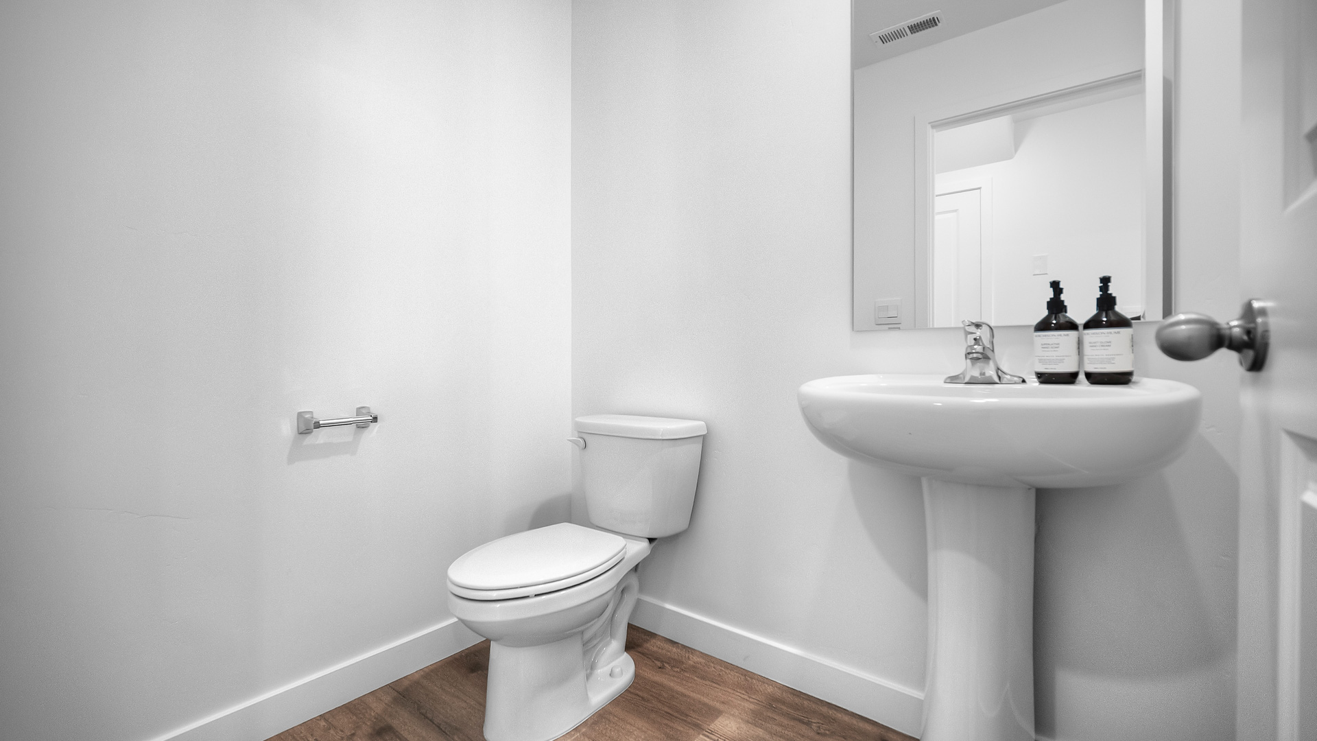 Powder bath with pedestal sink.