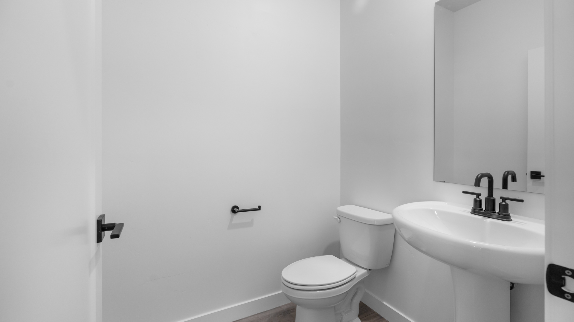 Powder bath featuring pedestal sink.