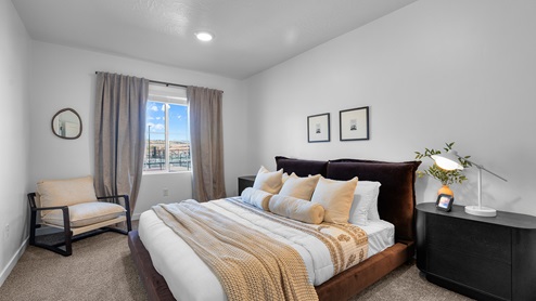 Bedroom with large window.