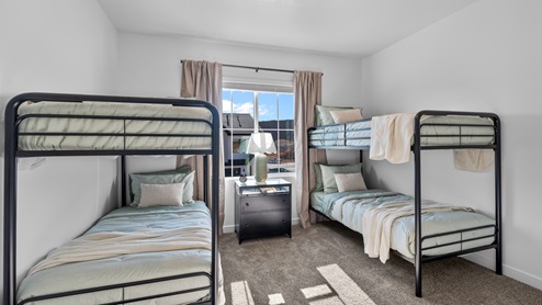 Bedroom with large window.
