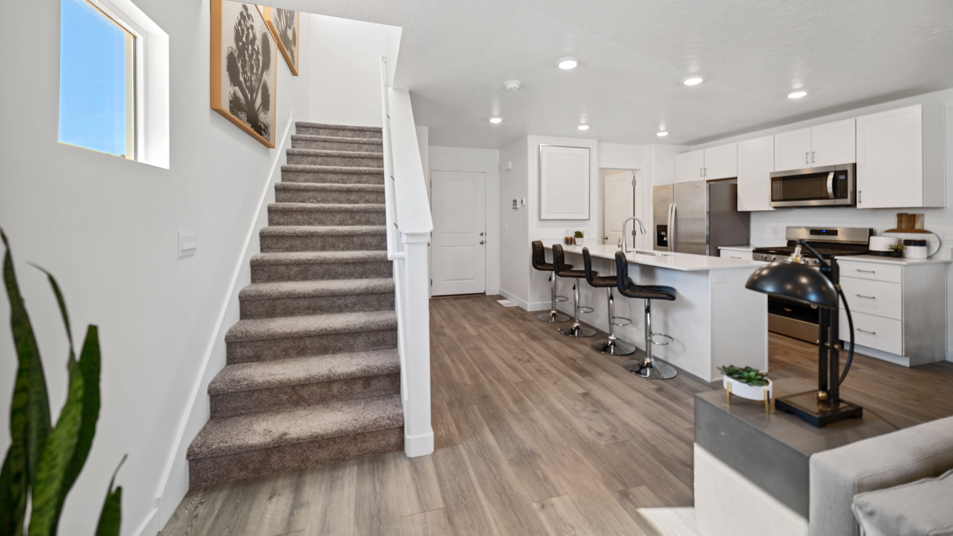 Off entry features stairs and main living space.