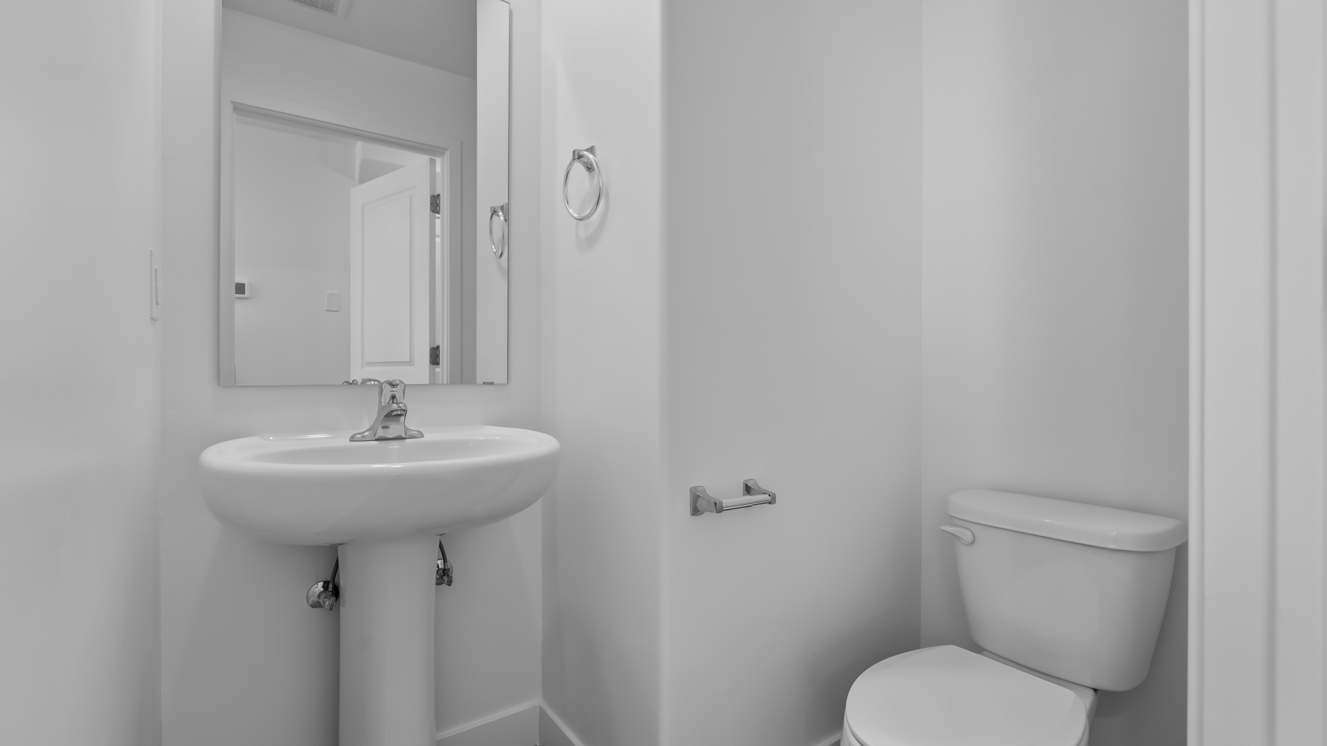 Powder bath with pedestal sink.