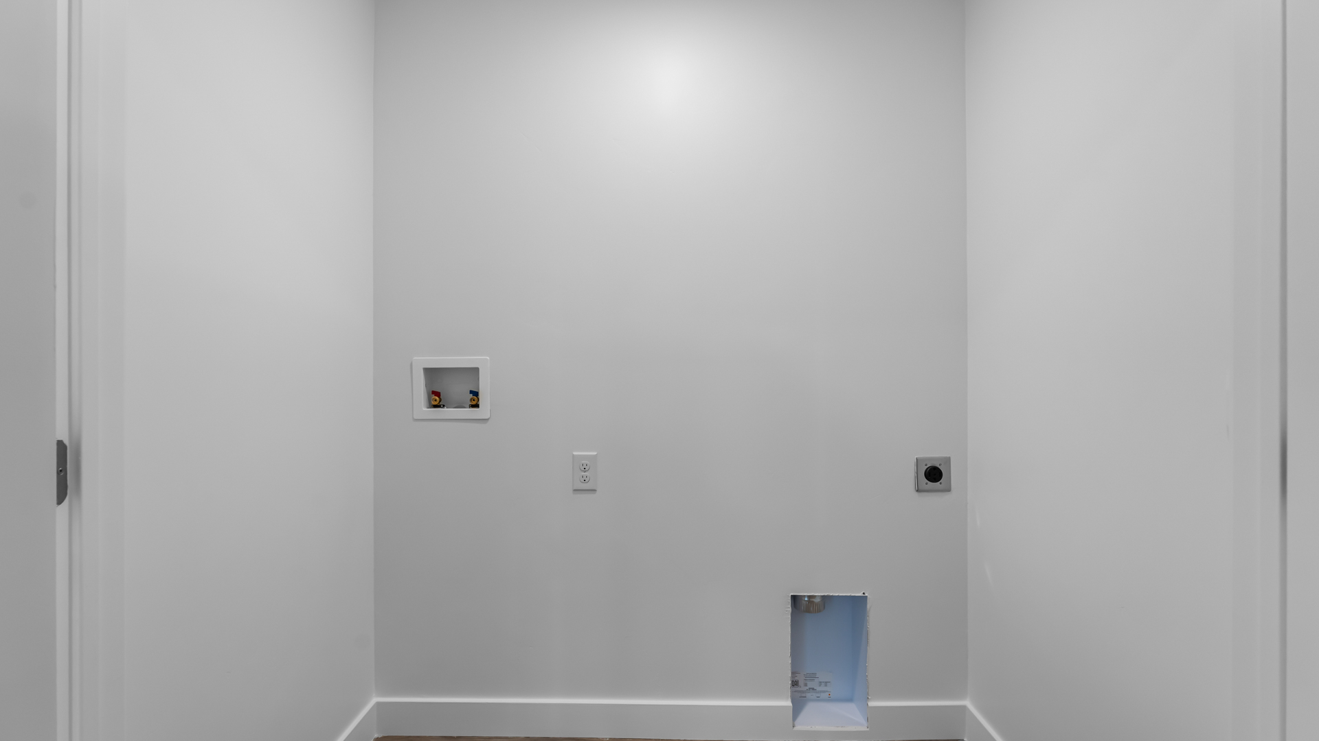 Spacious laundry room.