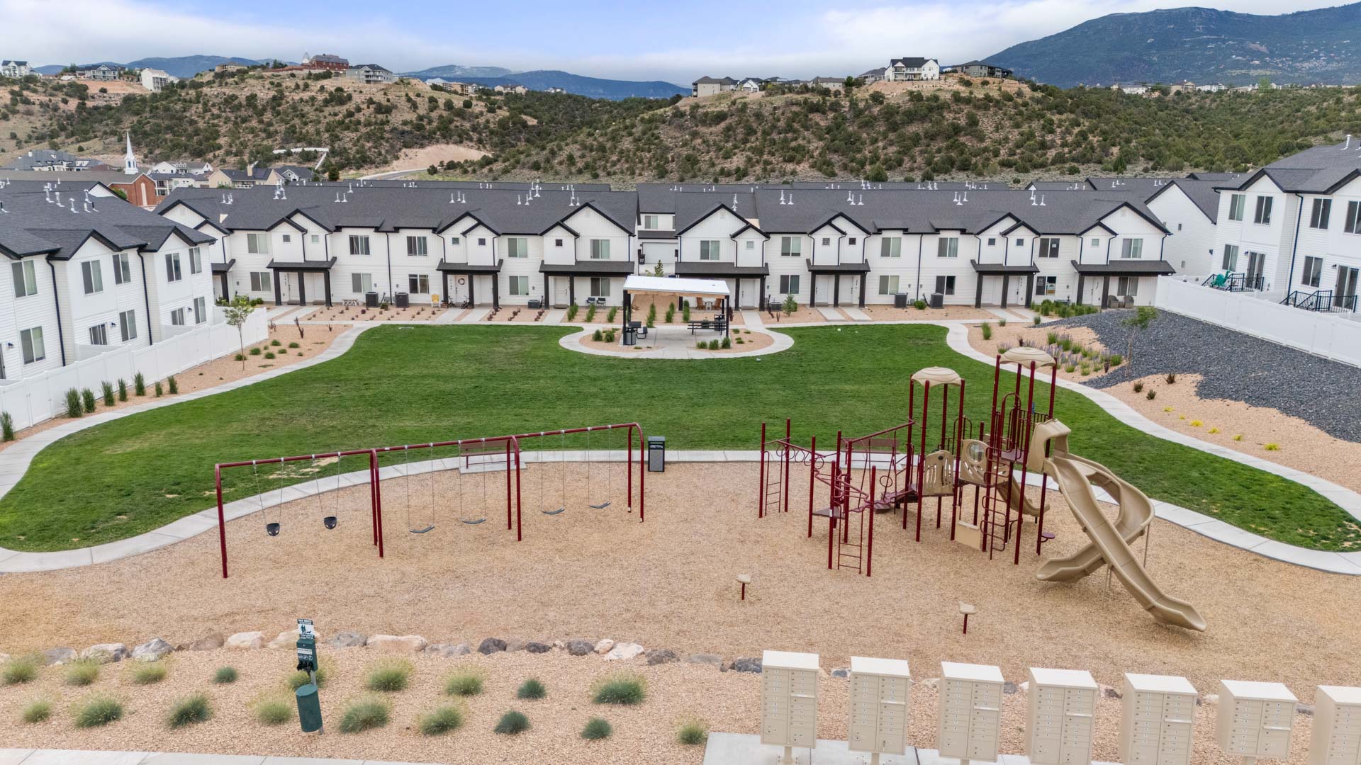 Old Sorrel Townhomes amenities with park, playground, and pavilion.