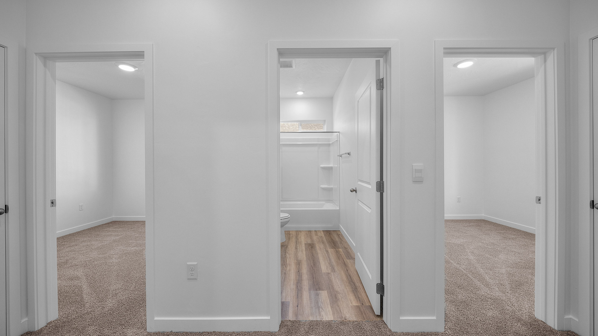 Hallway into bedrooms and bathroom.
