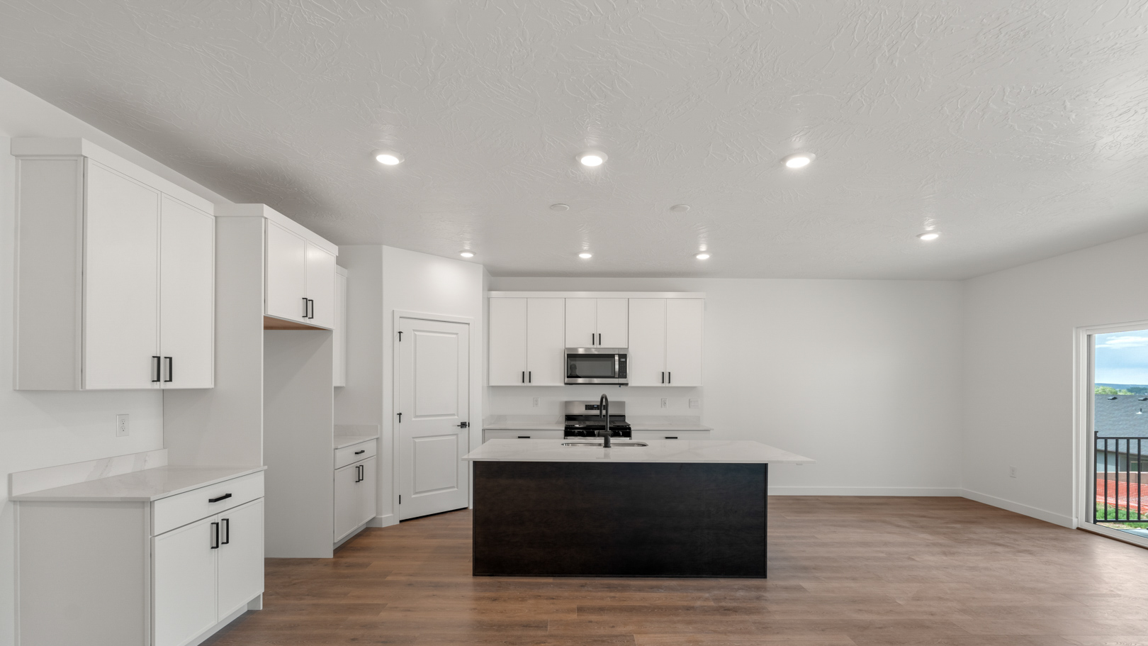 Kitchen featuring cabinets and countertops.