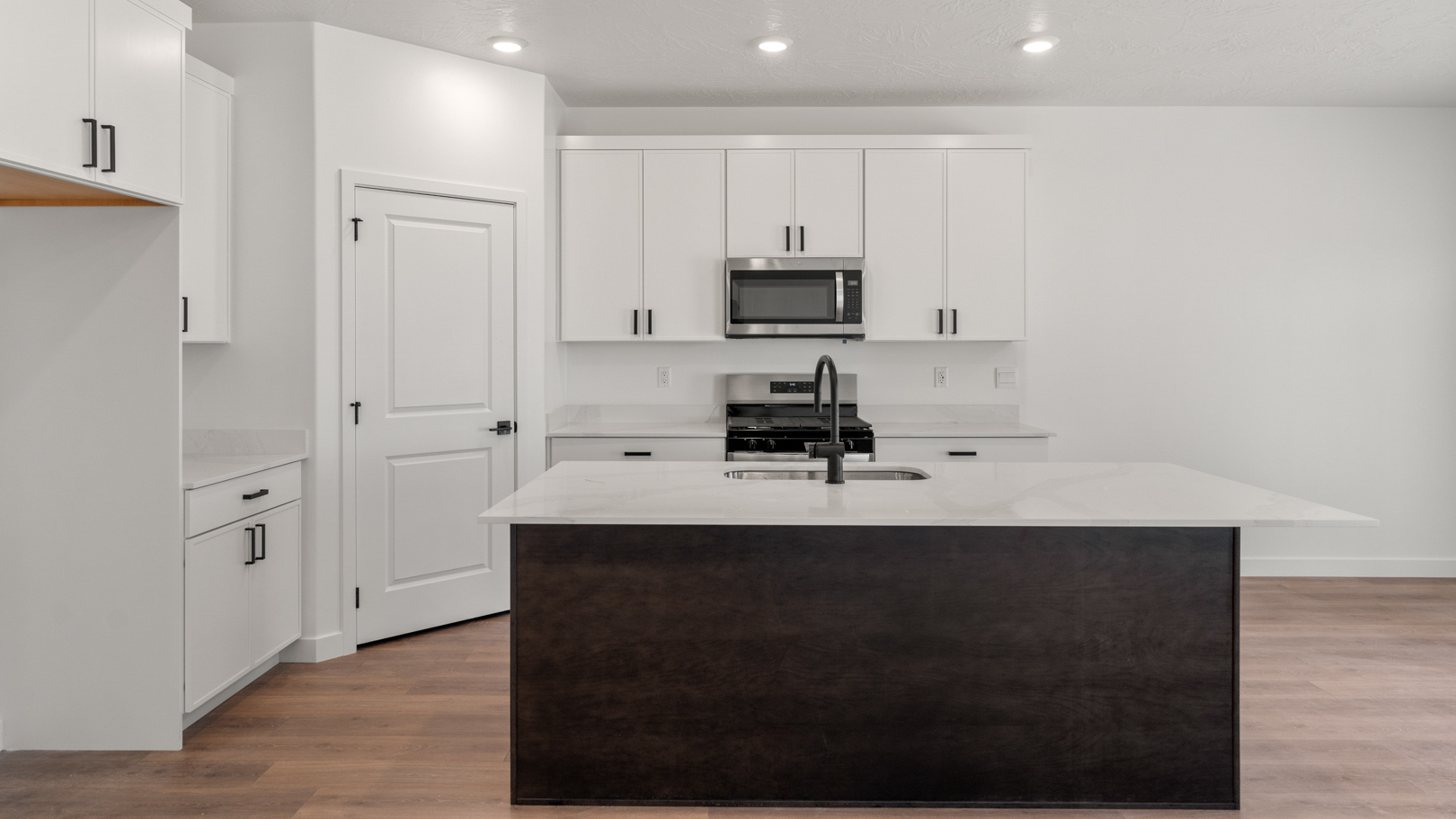 Kitchen featuring cabinets and countertops.