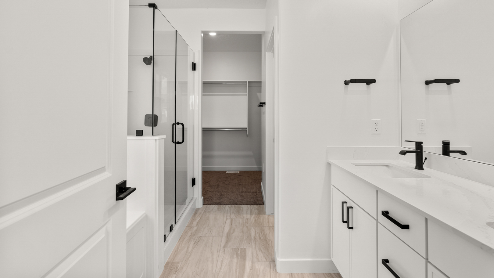 Primary bathroom with double sink vanity.