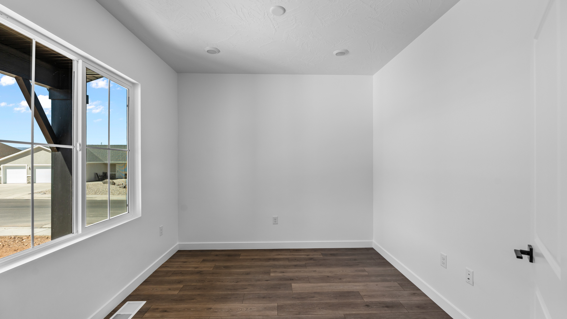 Office space with large window.