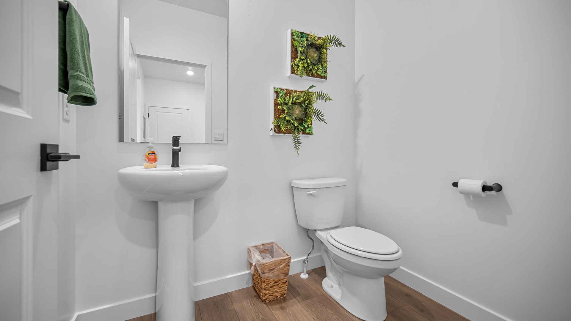 Powder bath with pedestal sink.