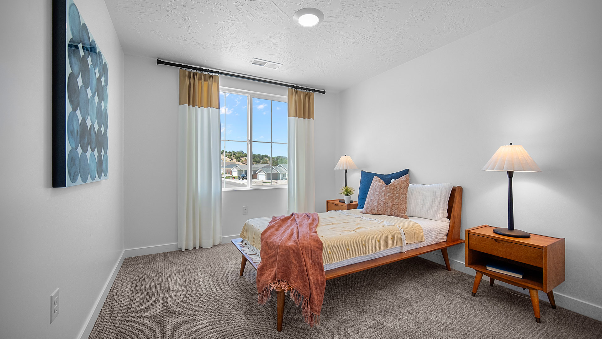Bedroom with large window.