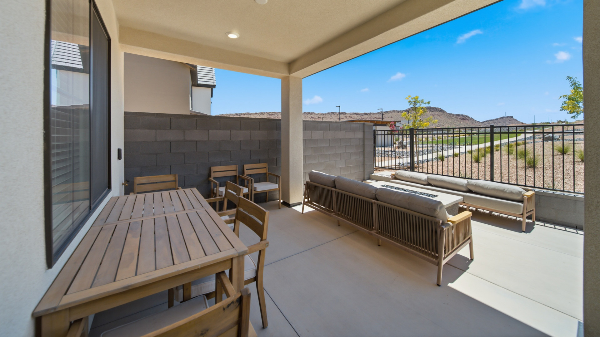Back of home with patio.