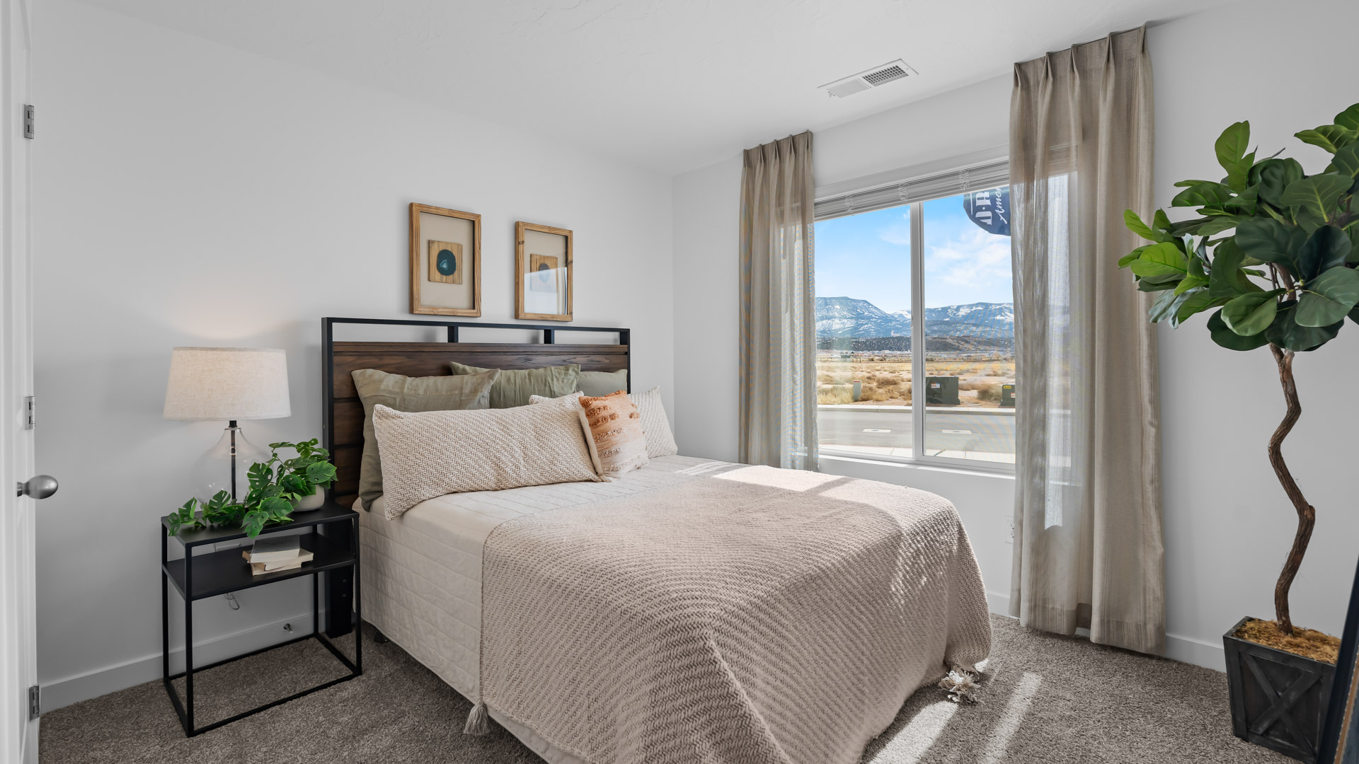 Bedroom with large window.