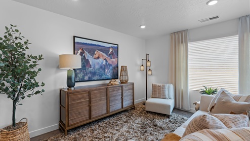 Family room with large window.