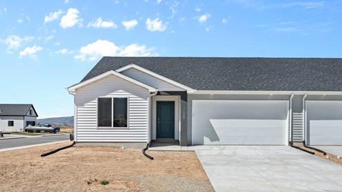 Elevation cape code Bella townhome plan in Pointe West.