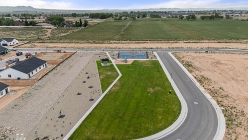 Aerial views of Pointe West amenities with park, pavilion, playground, and pickleball court.