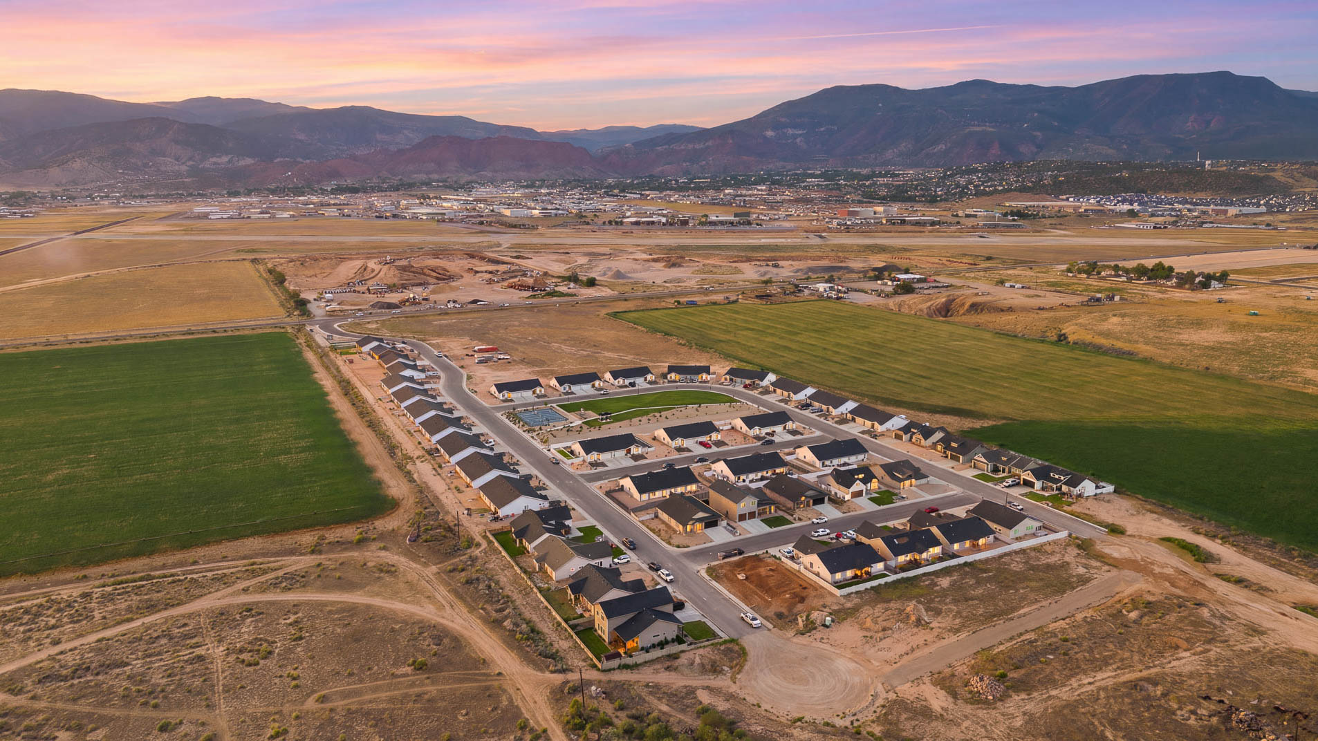 Aerial views of Pointe West amenities with park, pavilion, playground, and pickleball court.