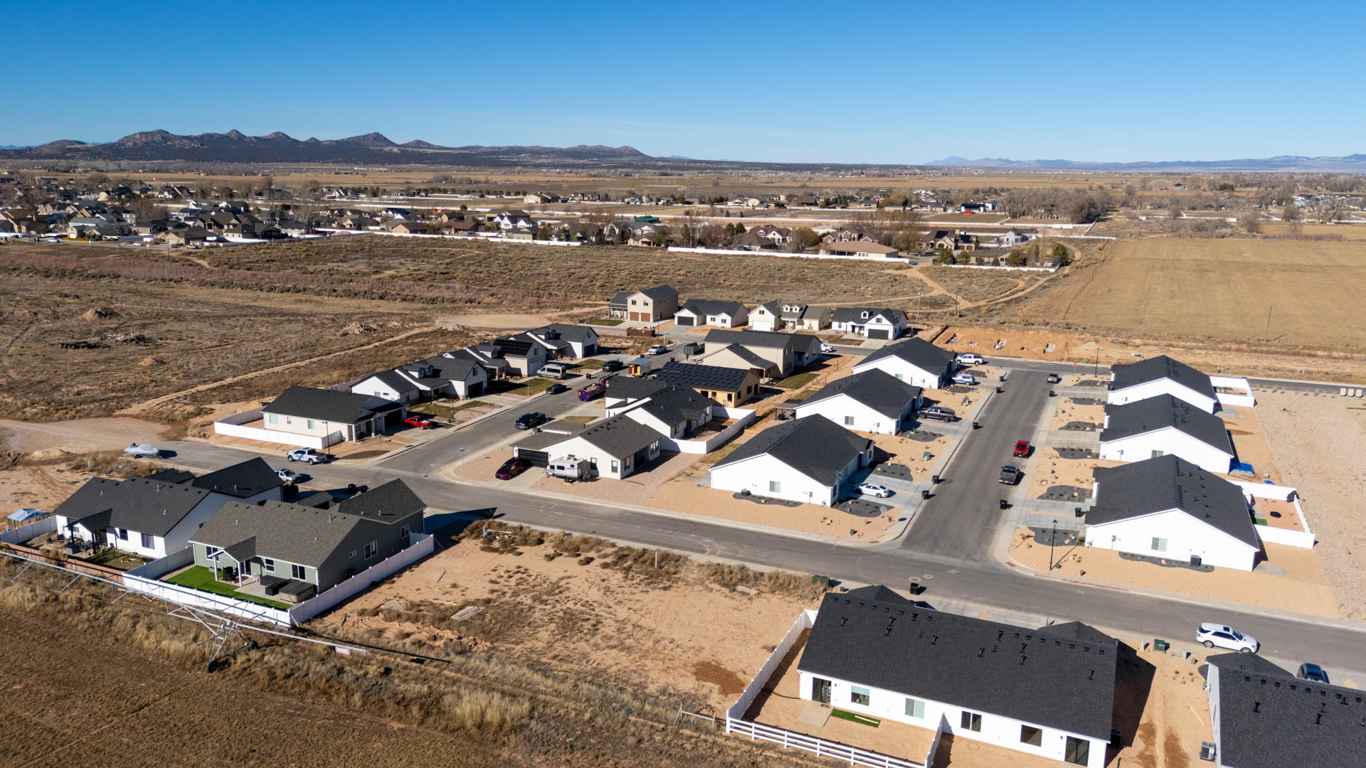 Aerial views of Pointe West amenities with park, pavilion, playground, and pickleball court.