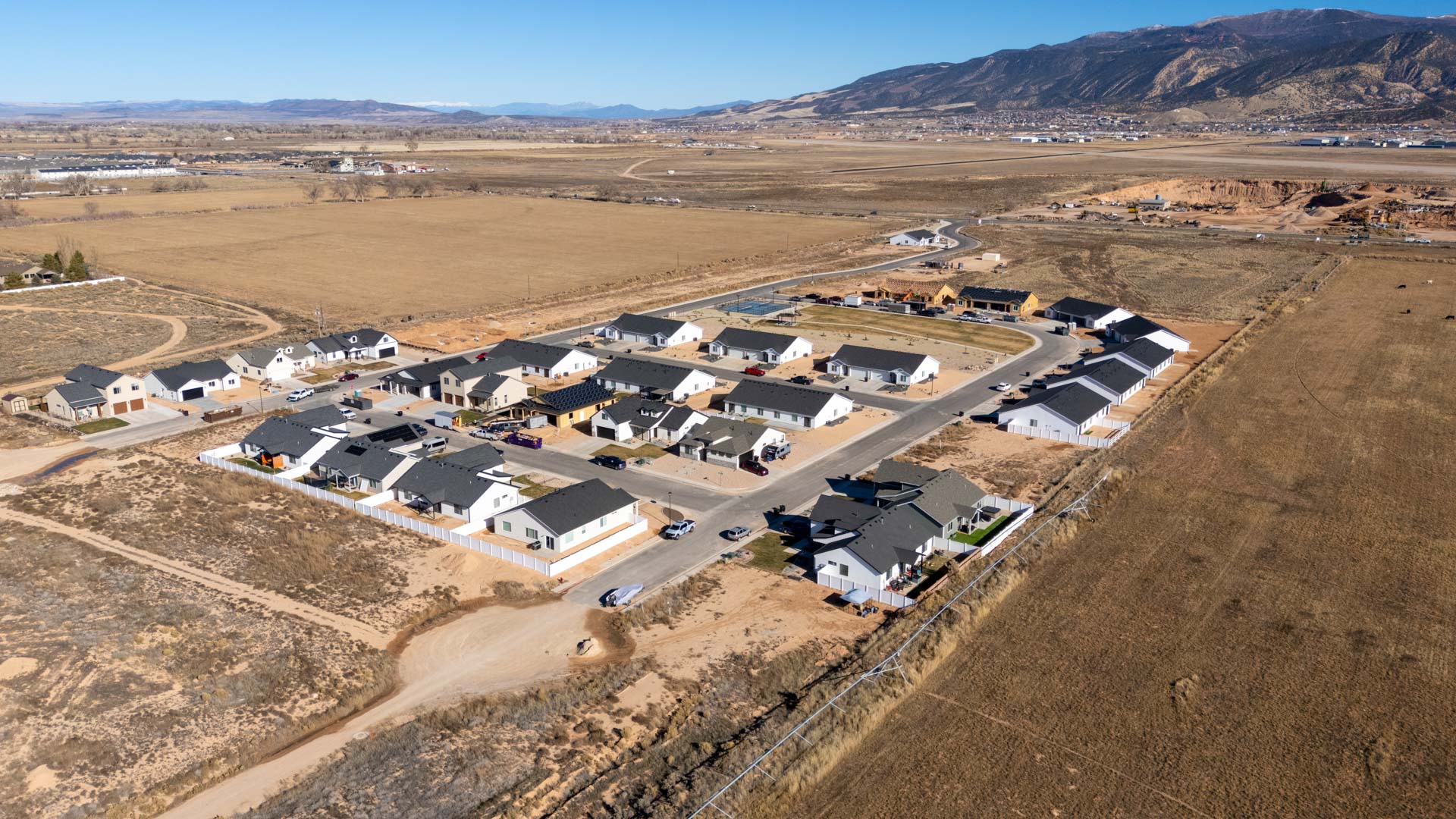 Aerial views of Pointe West amenities with park, pavilion, playground, and pickleball court.