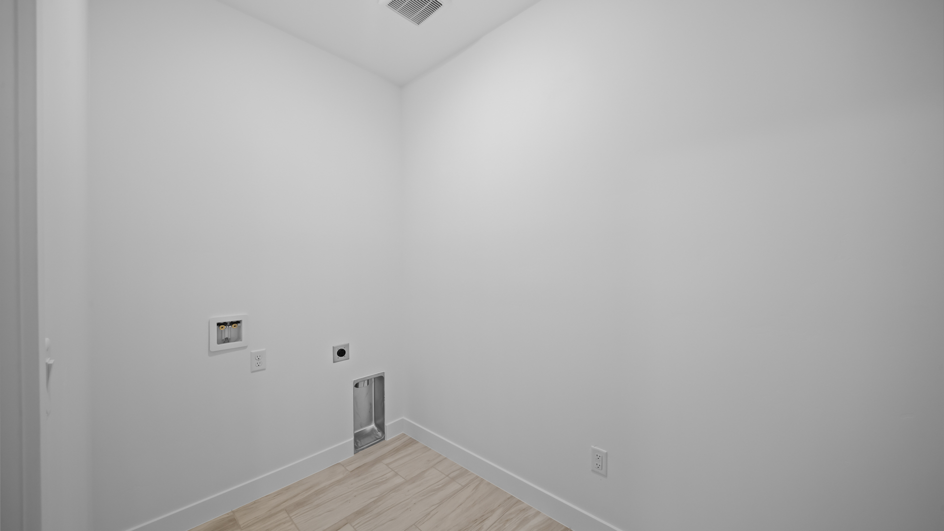 Laundry room off mudroom.