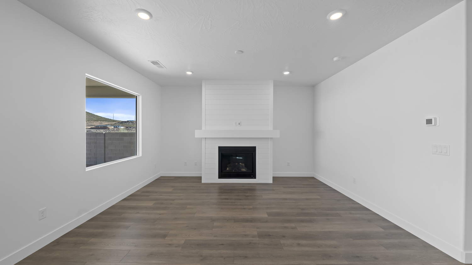 Family room with fireplace.