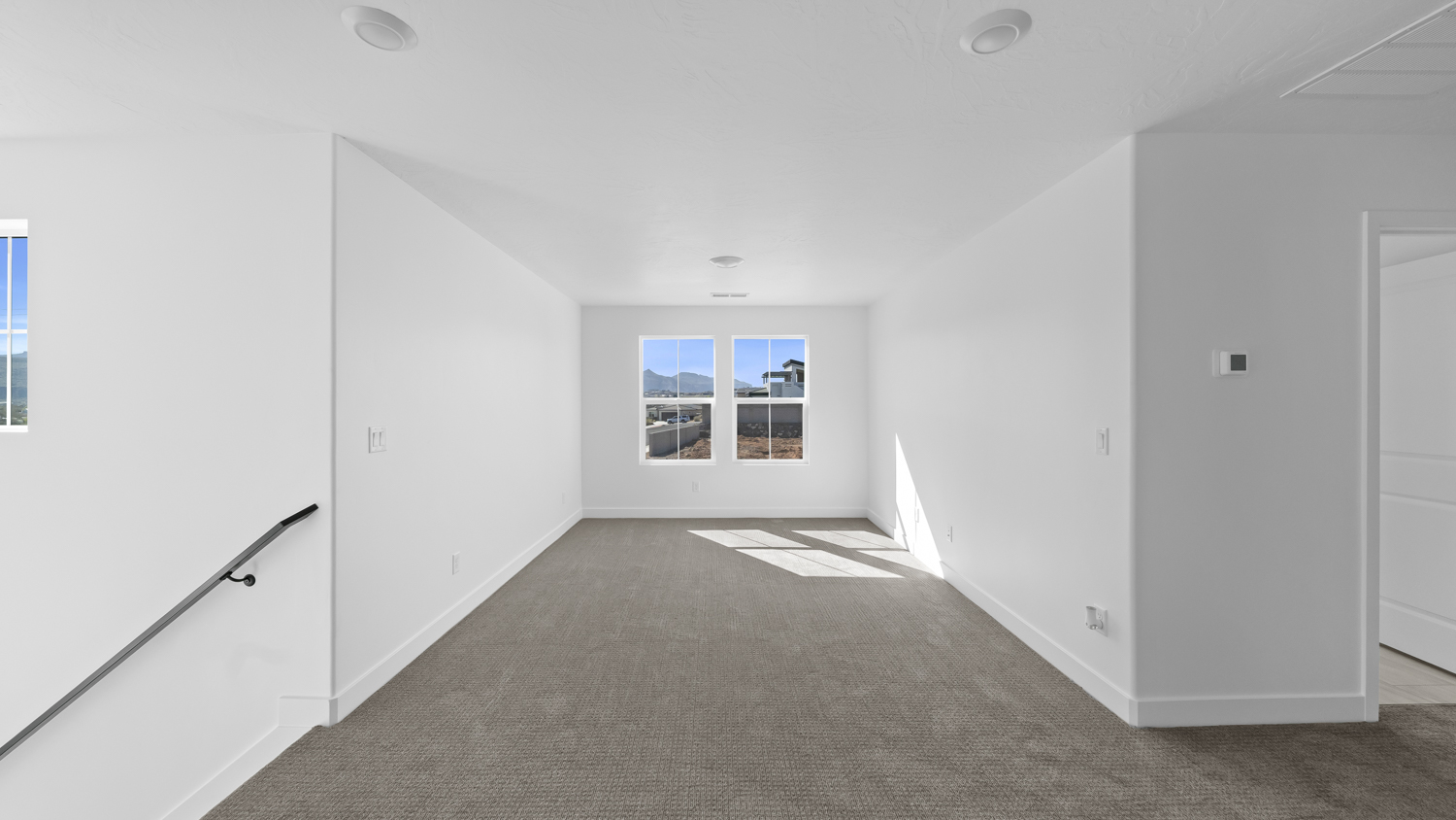 Upstairs loft space with window.