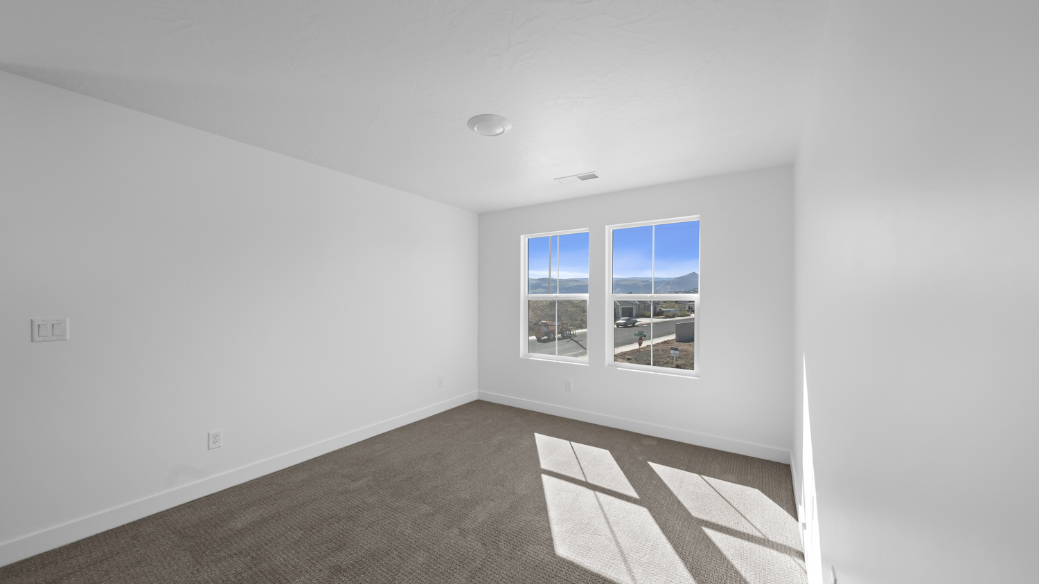 Bedroom with windows.