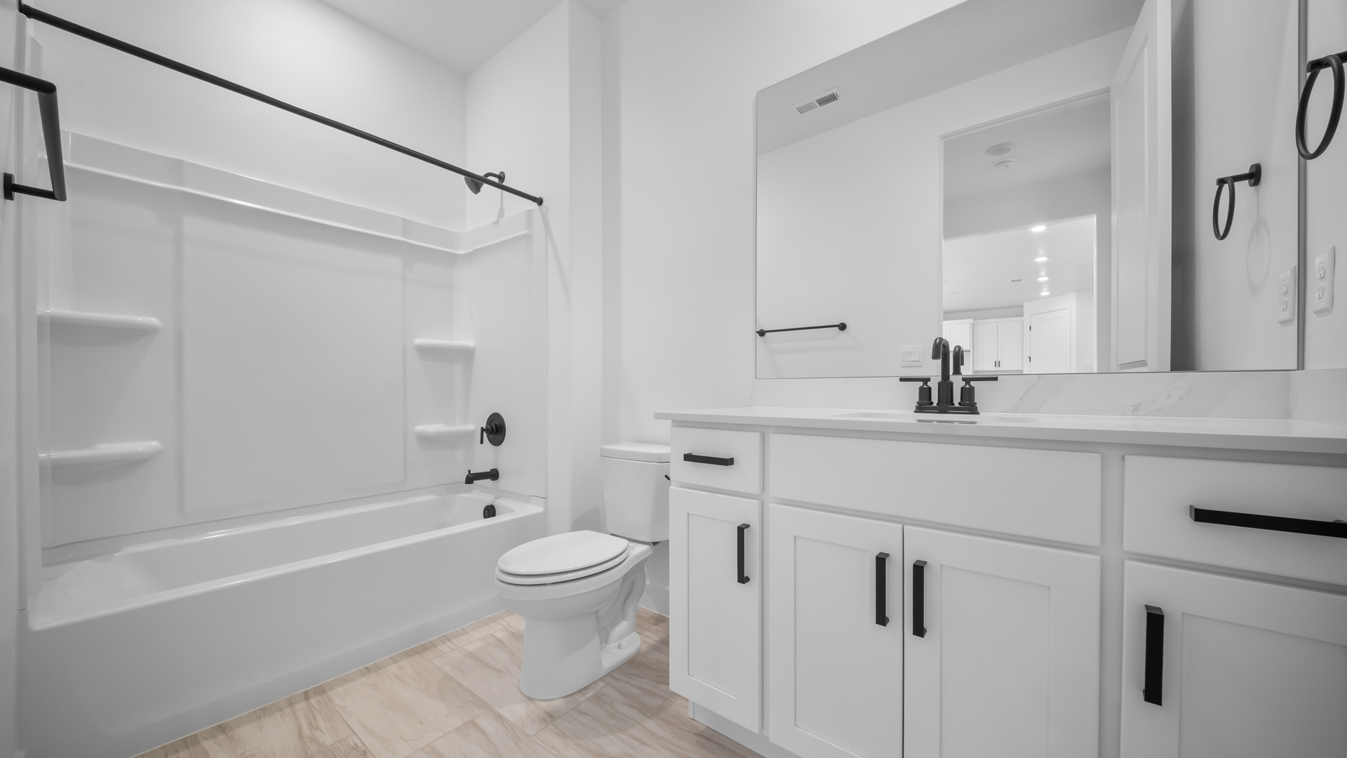 Bathroom with shower surround.