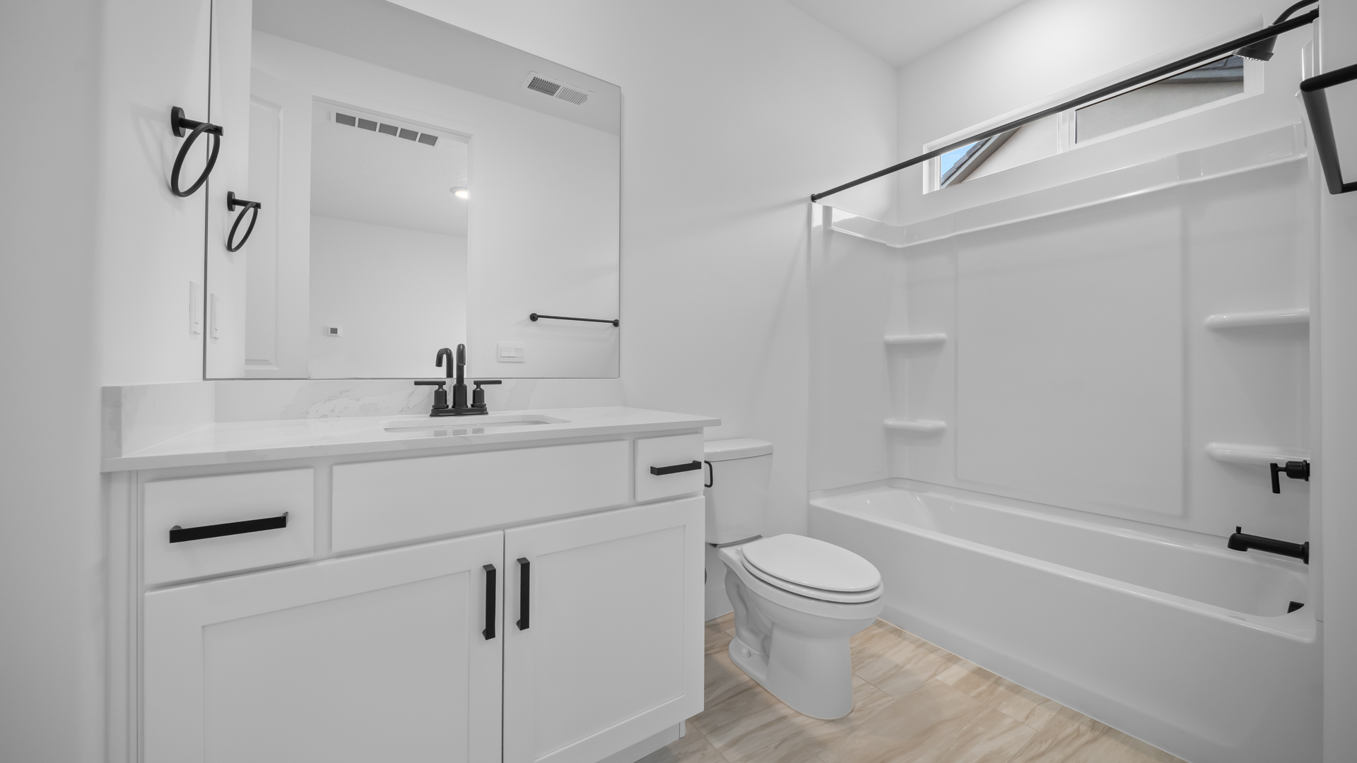 Casita bathroom with shower surround.