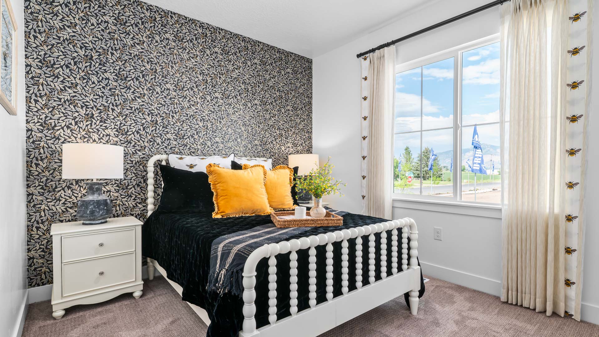 Bedroom with large window.