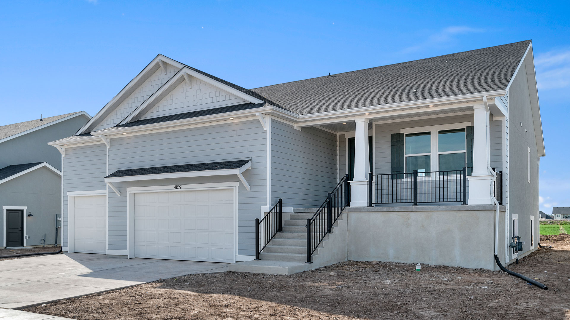 Livingston Craftsman elevation 3 car.