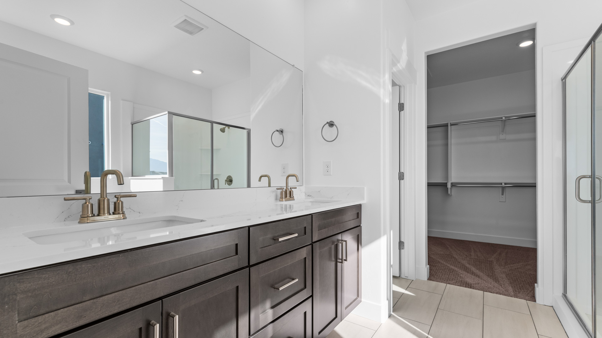 Primary bathroom with double sink vanity.