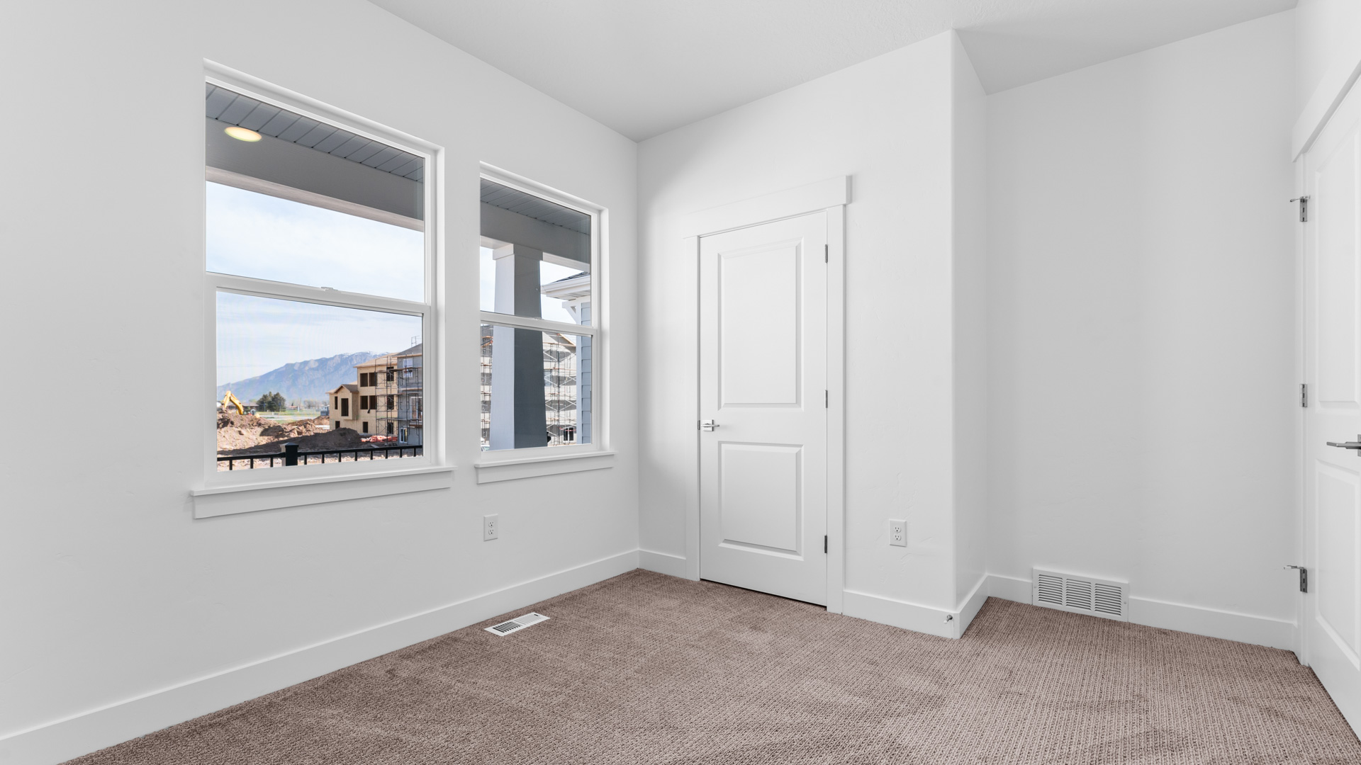 Bedroom with windows.