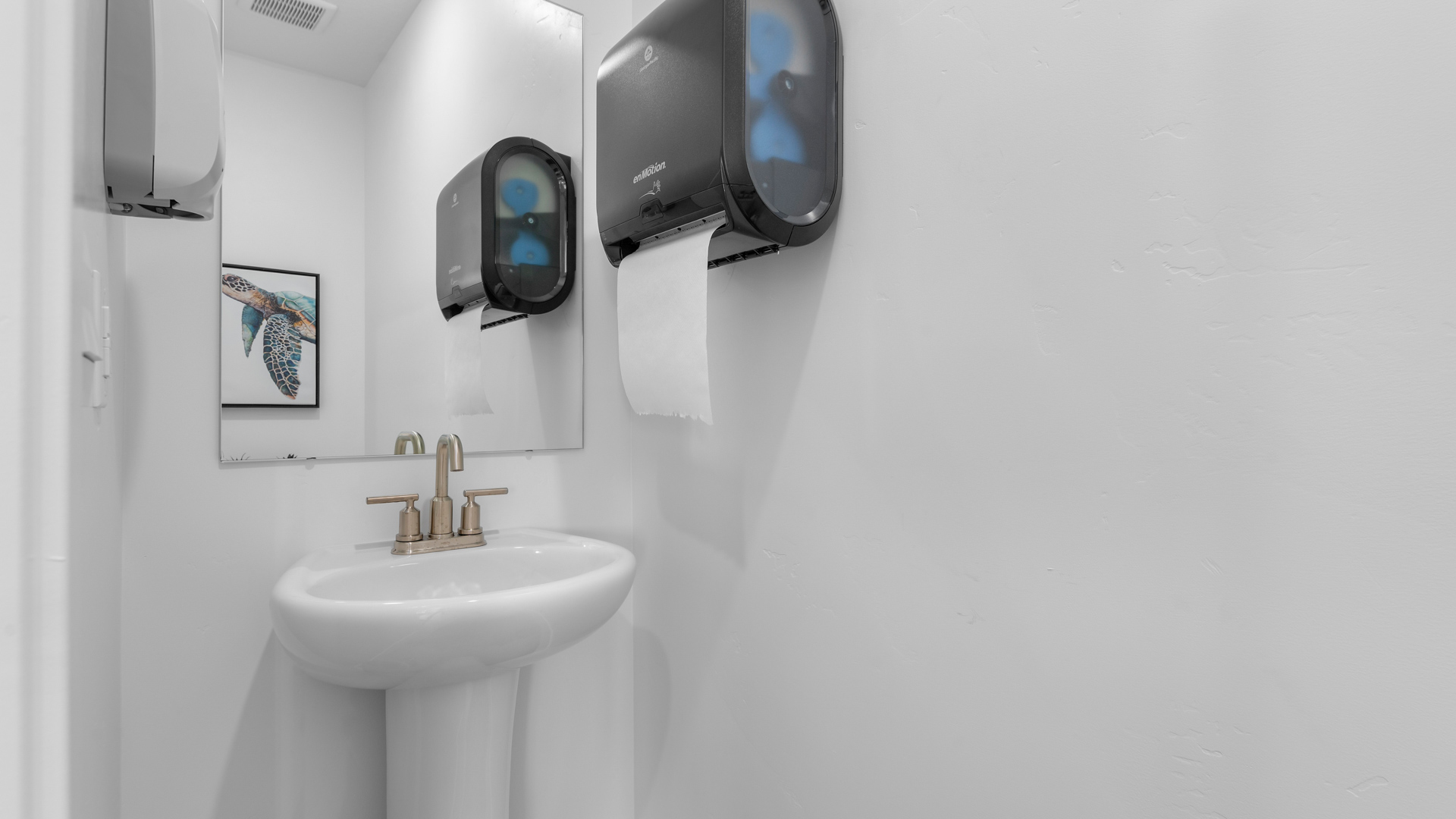 Powder bath with pedestal sink.