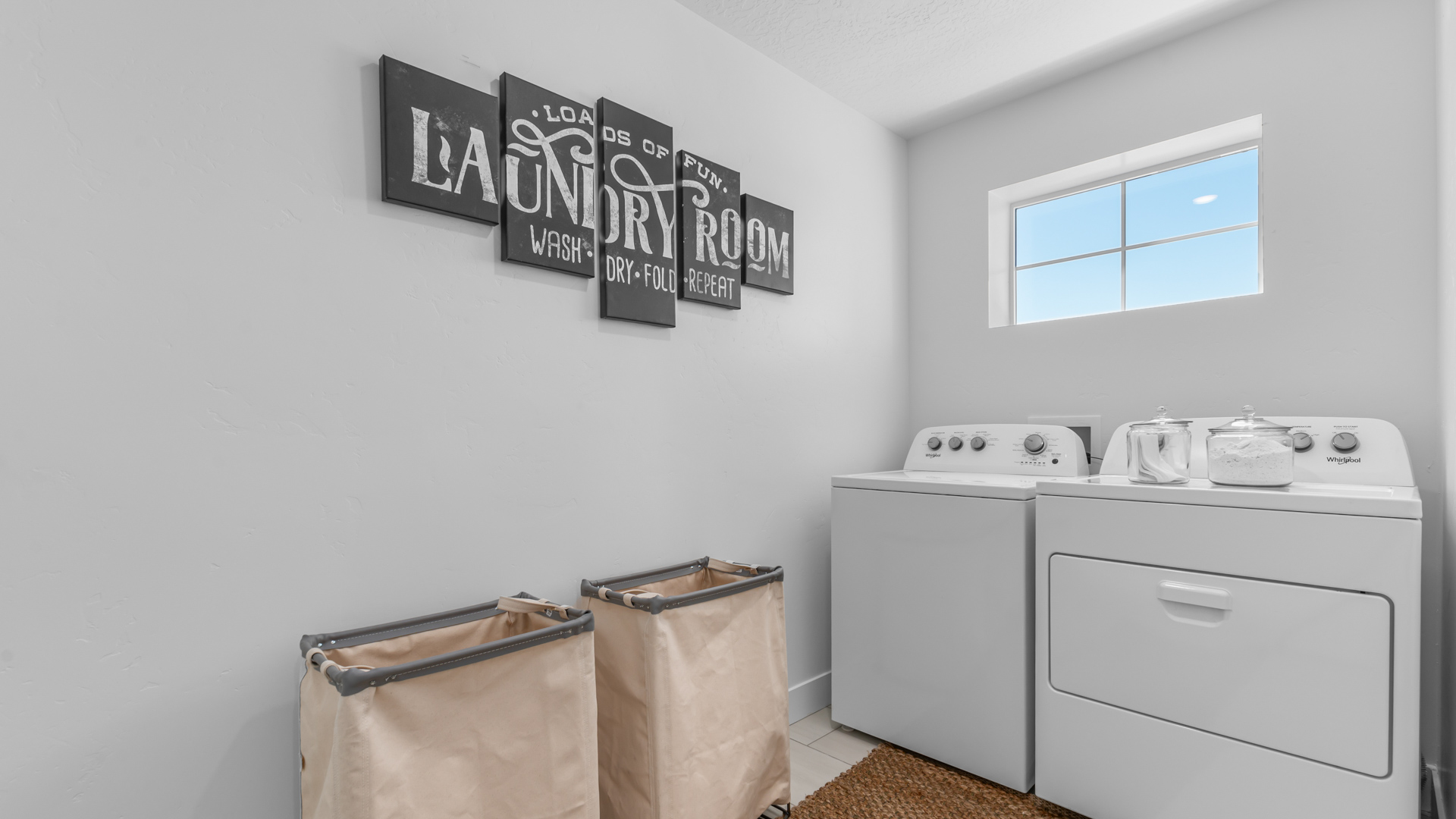 Laundry room with window.