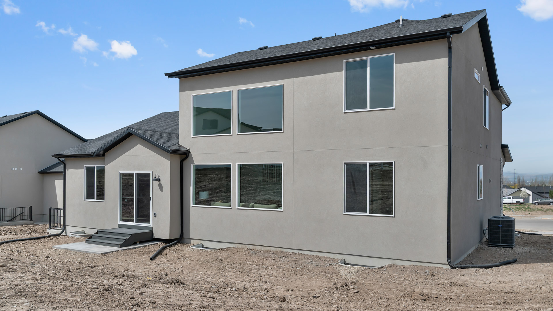 Transitional elevation Harmony home.