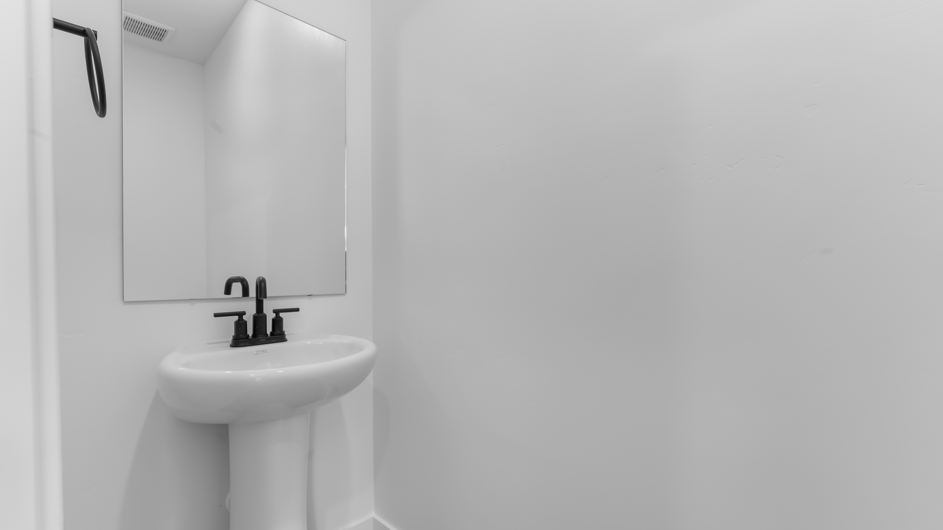 Powder bath with pedestal sink.