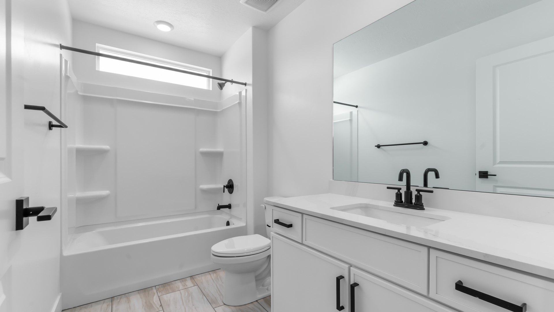 Bathroom with shower surround.