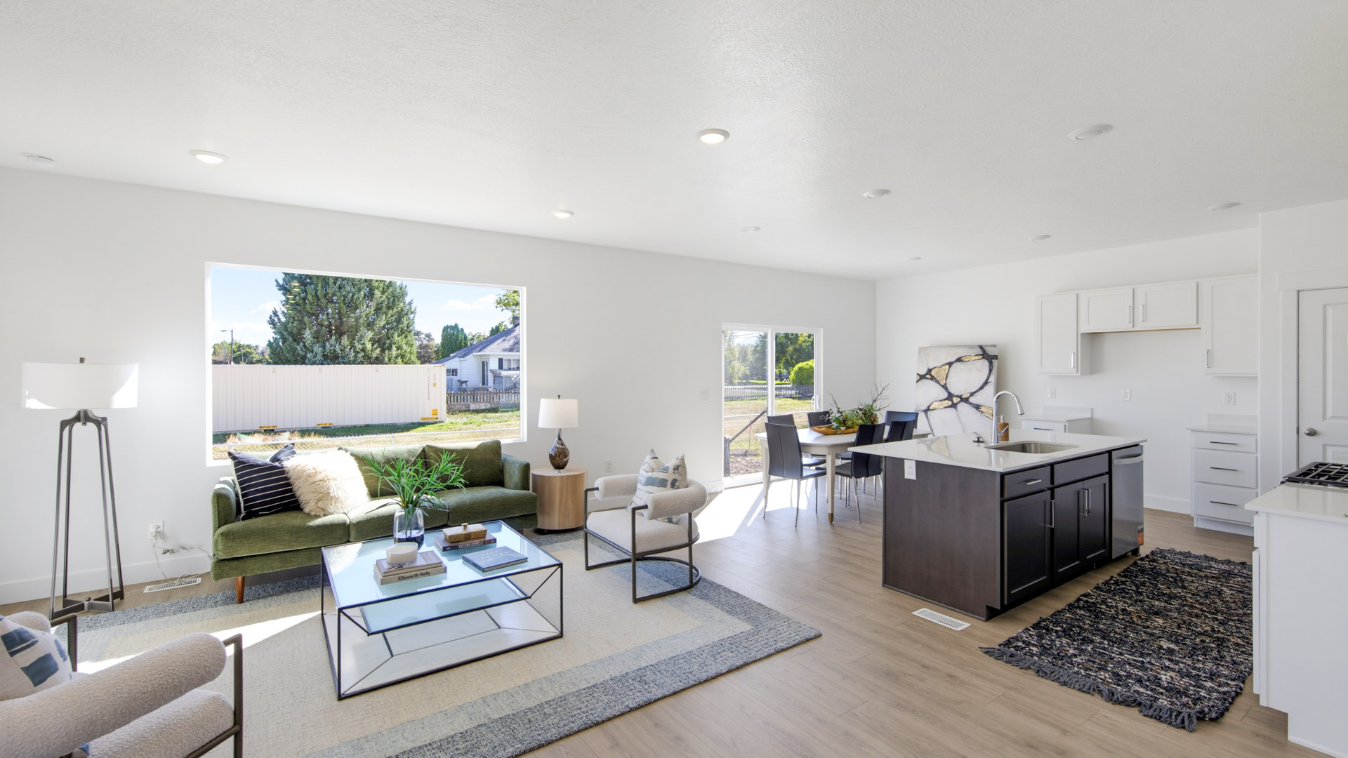 Family room, kitchen, and dining space.