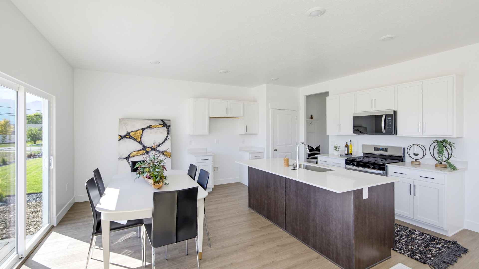 Family room, kitchen, and dining space.