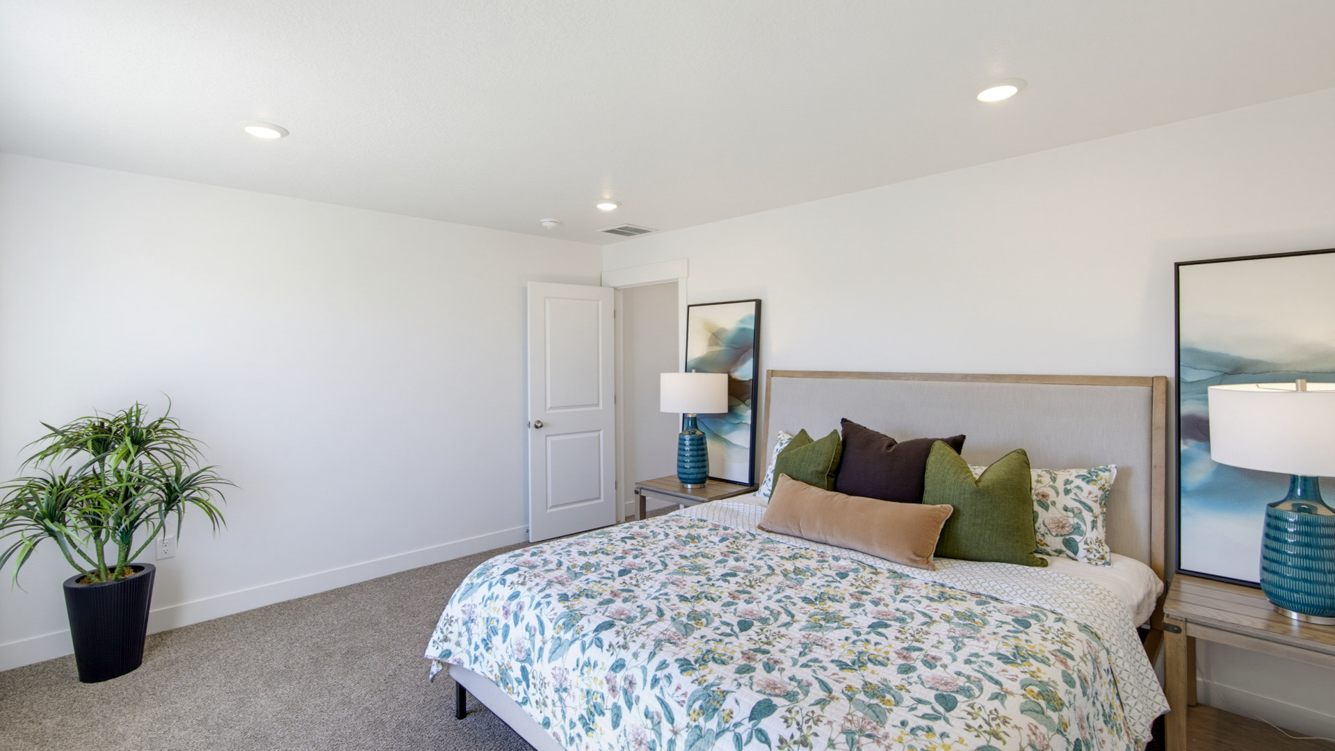 Primary bedroom with large window.